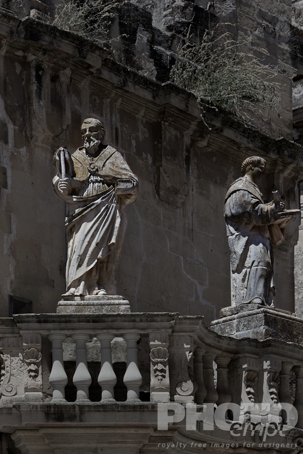 Italy South - Puglia. . . . . Balustrade with stone statues of saints at entrance to Piazza del Duomo, monochrome detail, Lecce, Salento, Puglia, Southern Italy