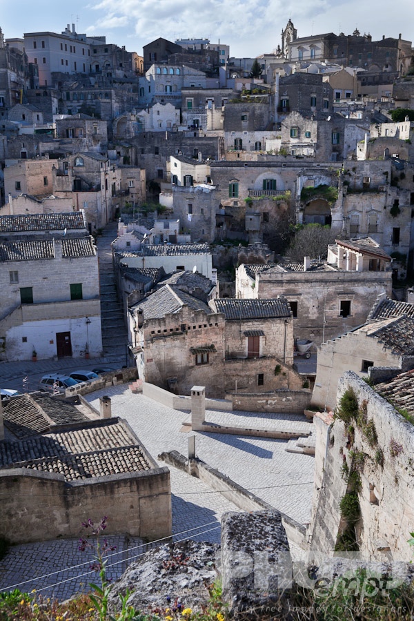 Italy South - Puglia. . . . . Aerial detail of ancient town of Matera with tufa houses, sunny spring afternoon, Puglia, Southern Italy,